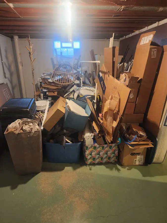 Roll-off dumpster container at job site for 2 Yard Dumpster Rental in Bridgton